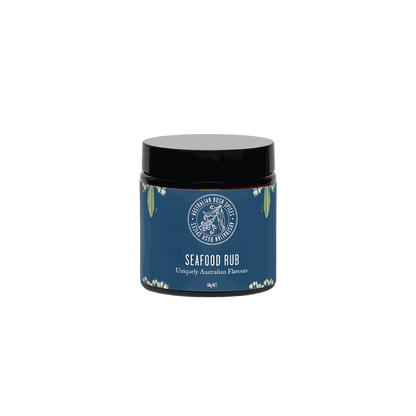 Australian Seafood Spice Blend in glass jar and cardboard box with fresh seafood ingredients